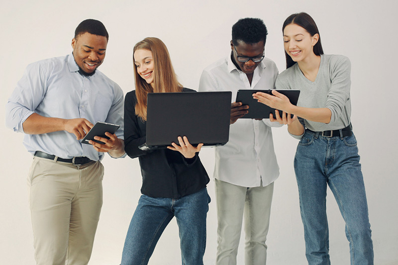 young-international-people-working-together-use-laptop
